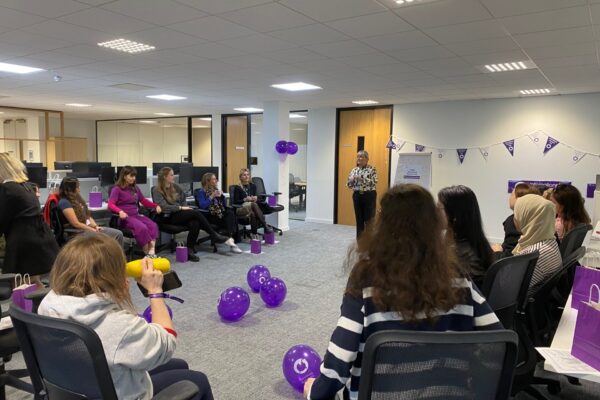 6 Women in a room during a training meeting