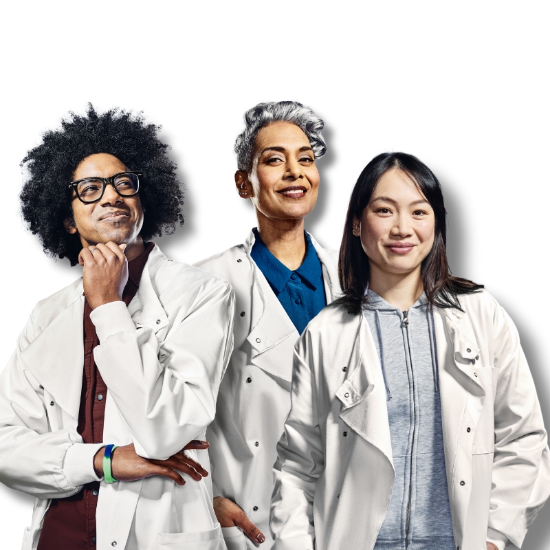 Image of several scientists in lab coats standing side by side